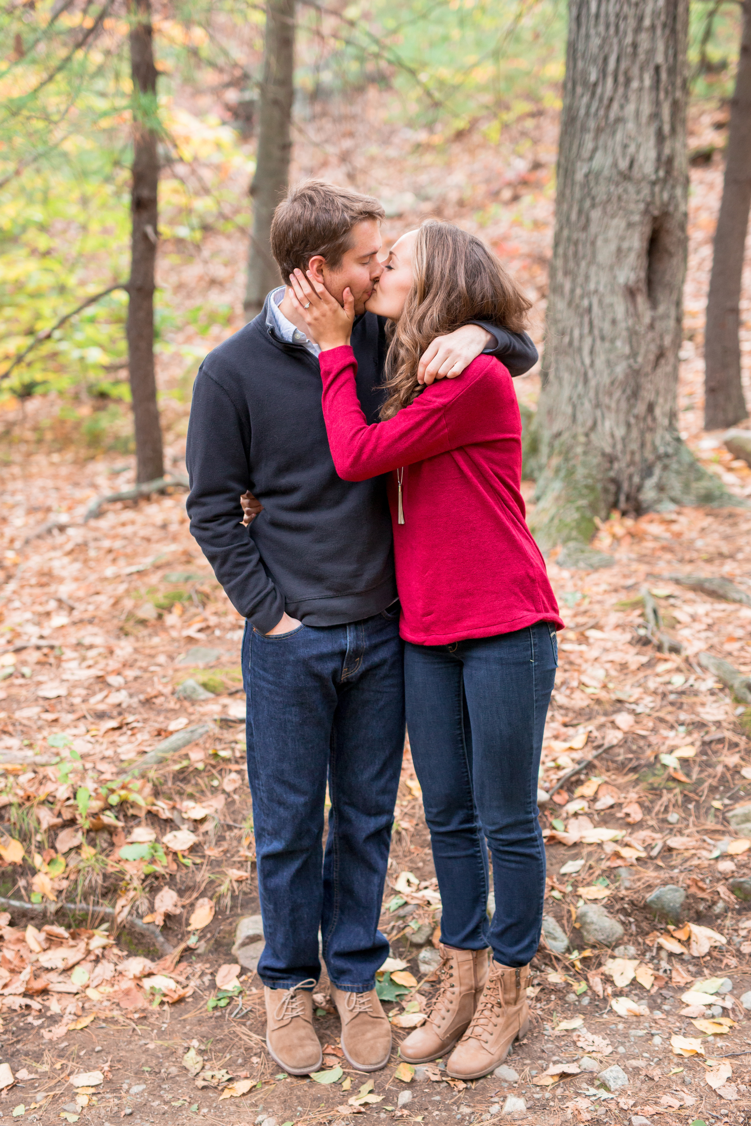 Couple kissing in Middlesex Fells