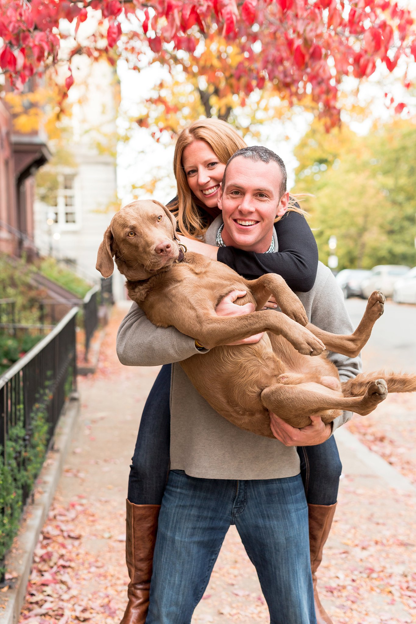 couple and their dog in charlestown in fall