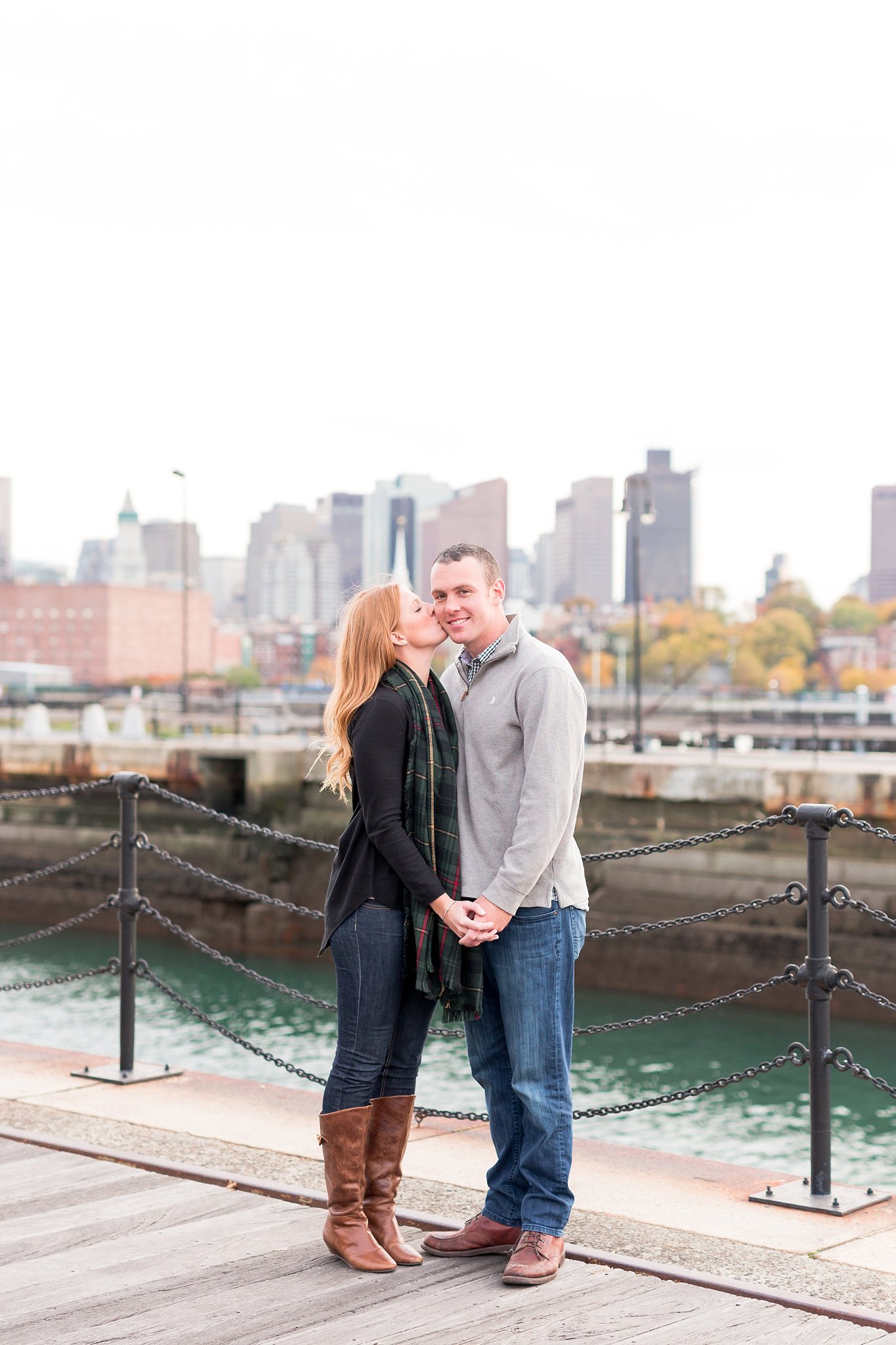 charlestown navy yard engagement session with boston skyline in the background
