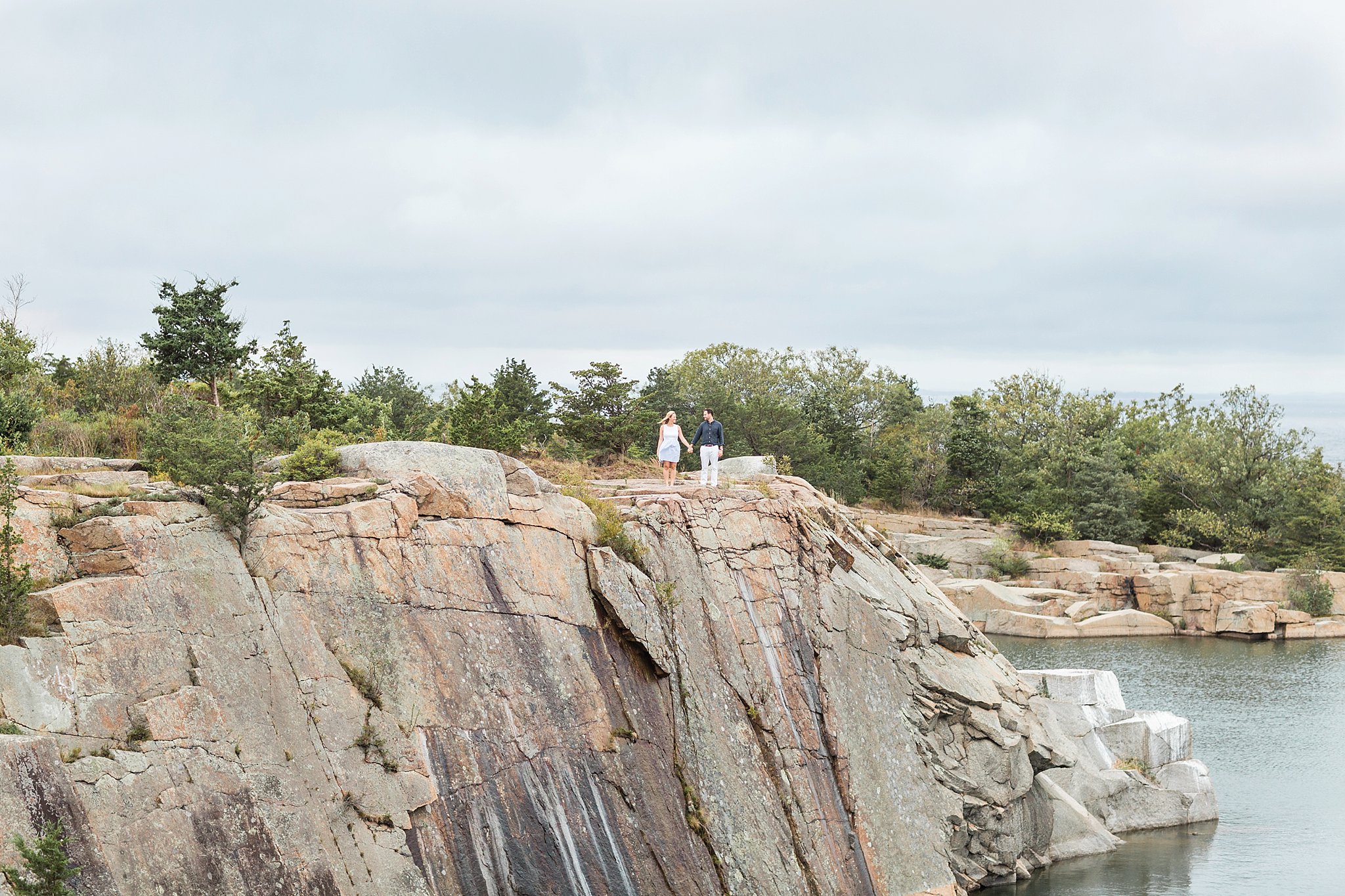 couple holding hands at halibut point state park