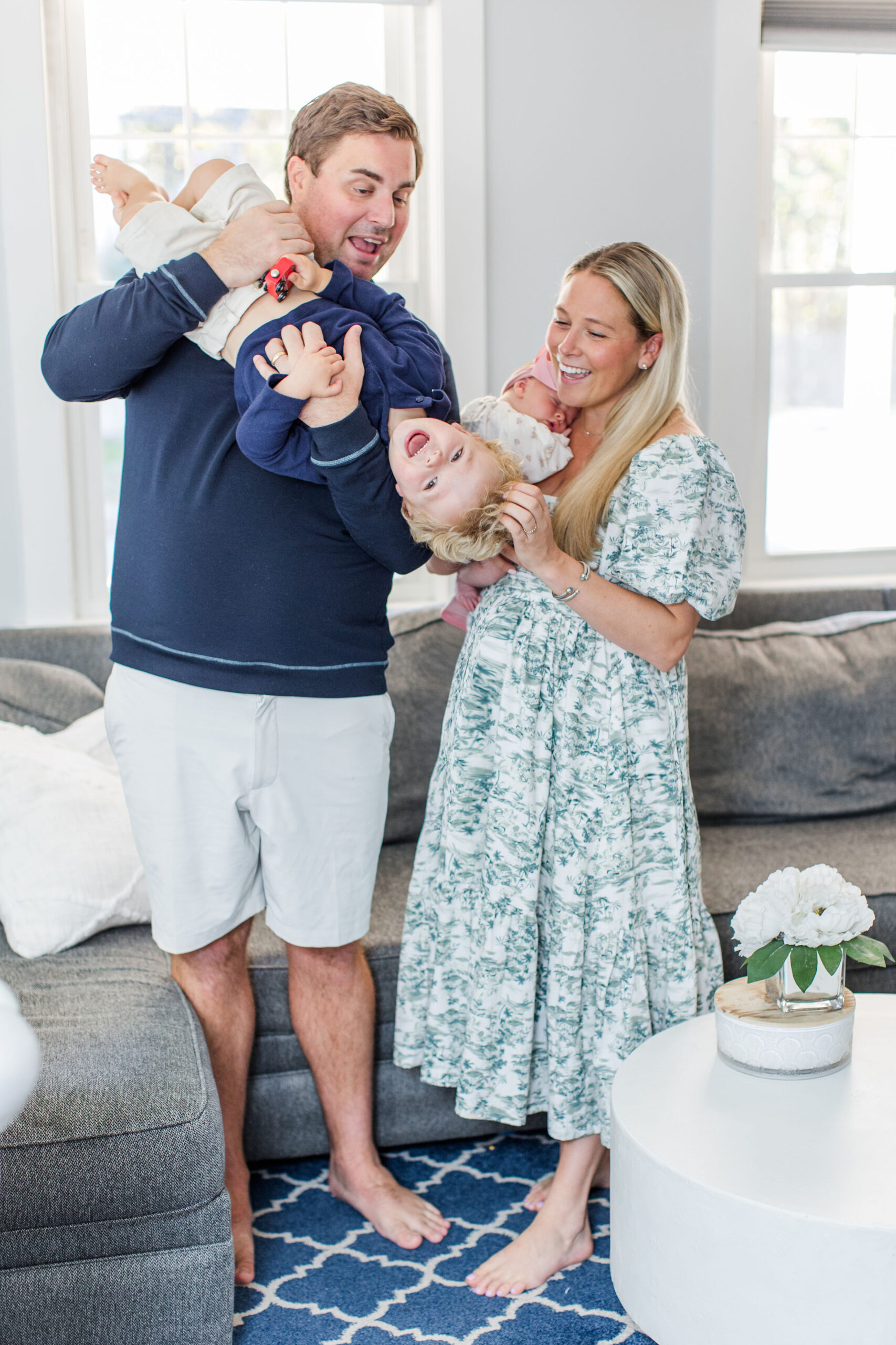 A family posing for newbron photos