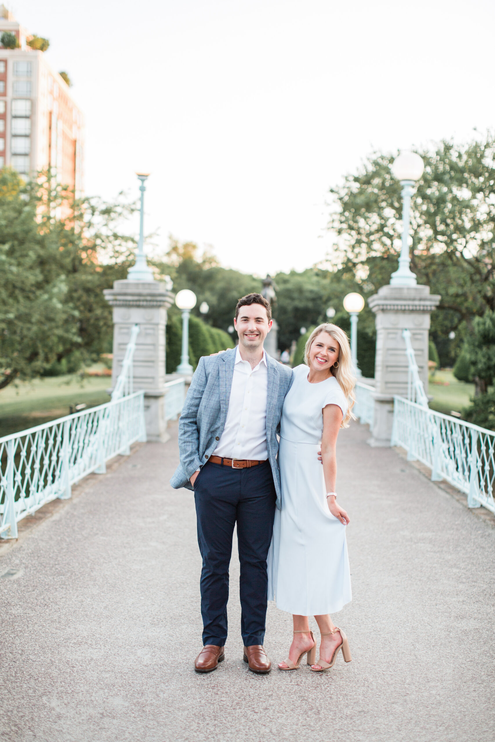 A couple posing at their Boston engagement photo location